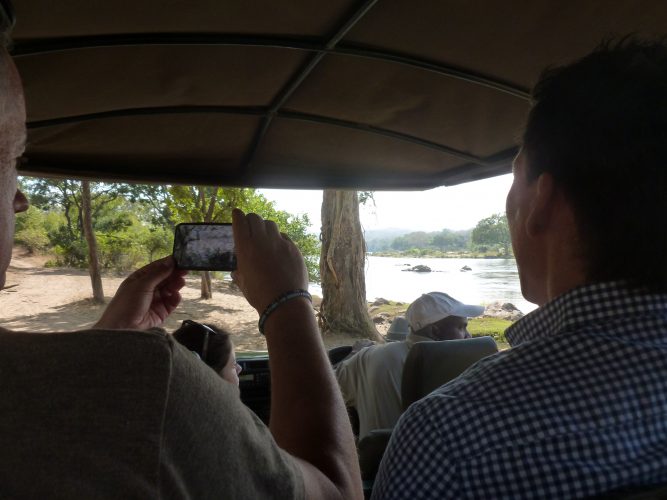 Taking a picture of someone taking a picture. Besides the driver, there were 8 people on the car - all from Germany. So we did the introductory round in German. Not exactly what you would expect somewhere in the bush at the end of the world.